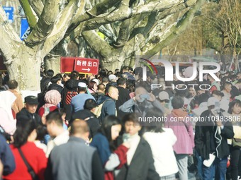 Crowds are gathering along the West Lake in Hangzhou, Zhejiang Province, China, on February 11, 2024. (