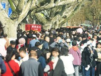 Crowds are gathering along the West Lake in Hangzhou, Zhejiang Province, China, on February 11, 2024. (