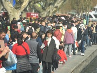 Crowds are gathering along the West Lake in Hangzhou, Zhejiang Province, China, on February 11, 2024. (