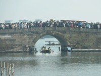 People are crowding on the broken West Lake Bridge in Hangzhou, Zhejiang Province, China, on February 11, 2024. (