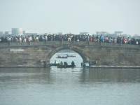 People are crowding on the broken West Lake Bridge in Hangzhou, Zhejiang Province, China, on February 11, 2024. (