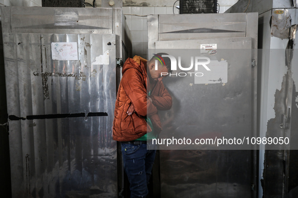 Palestinians are mourning their relatives, who were killed in an overnight Israeli strike on Deir al-Balah, during a mass funeral at the Al-...