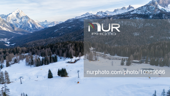 Aerial view of people skiing near Cortina d'Ampezzo, Italy, on February 4, 2024. A mild winter across Europe has resulted in several ski slo...