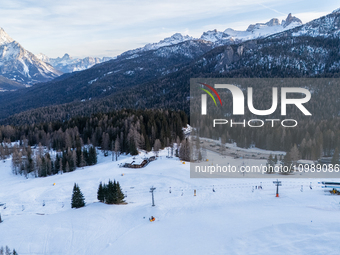 Aerial view of people skiing near Cortina d'Ampezzo, Italy, on February 4, 2024. A mild winter across Europe has resulted in several ski slo...