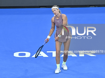 Victoria Azarenka from Belarus is reacting during her first-round match against Magdalena Frech of Poland at the WTA 1000-Qatar TotalEnergie...