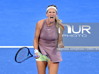 Victoria Azarenka from Belarus is reacting during her first-round match against Magdalena Frech of Poland at the WTA 1000-Qatar TotalEnergie...