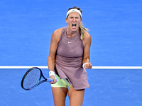 Victoria Azarenka from Belarus is reacting during her first-round match against Magdalena Frech of Poland at the WTA 1000-Qatar TotalEnergie...