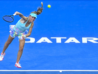 Magdalena Frech of Poland is in action during her first-round match against Victoria Azarenka of Belarus at the WTA 1000-Qatar TotalEnergies...