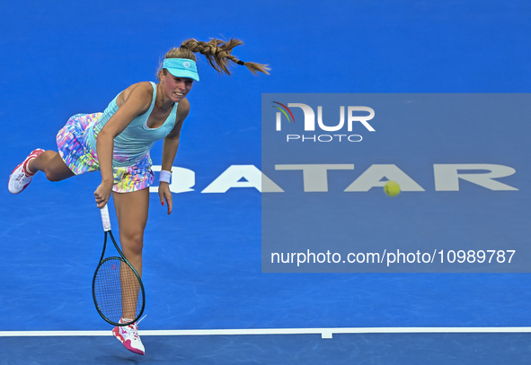 Magdalena Frech of Poland is in action during her first-round match against Victoria Azarenka of Belarus at the WTA 1000-Qatar TotalEnergies...