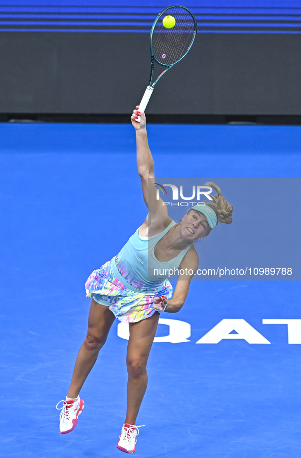 Magdalena Frech of Poland is in action during her first-round match against Victoria Azarenka of Belarus at the WTA 1000-Qatar TotalEnergies...