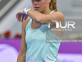 Magdalena Frech of Poland is reacting during her first-round match against Victoria Azarenka of Belarus at the WTA 1000-Qatar TotalEnergies...