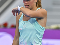 Magdalena Frech of Poland is reacting during her first-round match against Victoria Azarenka of Belarus at the WTA 1000-Qatar TotalEnergies...