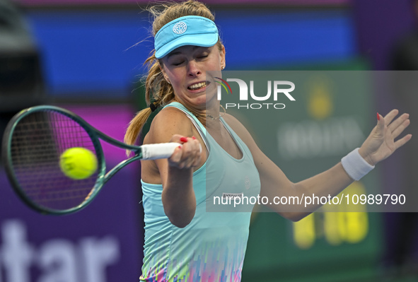 Magdalena Frech of Poland is in action during her first-round match against Victoria Azarenka of Belarus at the WTA 1000-Qatar TotalEnergies...