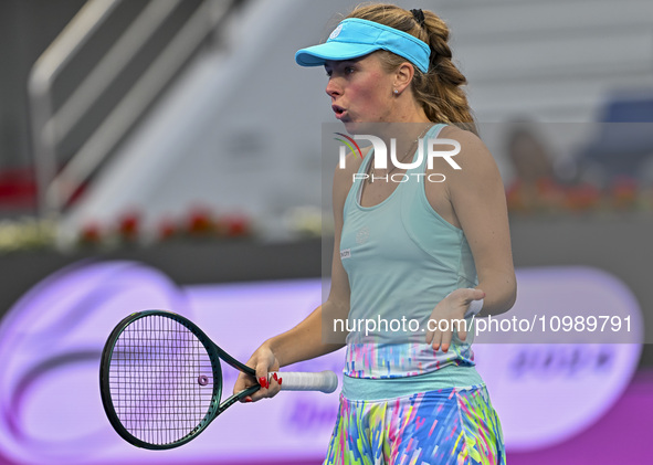 Magdalena Frech of Poland is reacting during her first-round match against Victoria Azarenka of Belarus at the WTA 1000-Qatar TotalEnergies...