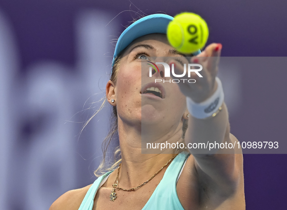 Magdalena Frech of Poland is in action during her first-round match against Victoria Azarenka of Belarus at the WTA 1000-Qatar TotalEnergies...