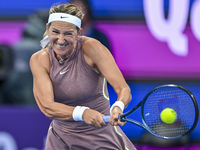 Victoria Azarenka from Belarus is playing in her first-round match against Magdalena Frech of Poland at the WTA 1000-Qatar TotalEnergies Ope...