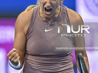 Victoria Azarenka from Belarus is reacting during her first-round match against Magdalena Frech of Poland at the WTA 1000-Qatar TotalEnergie...