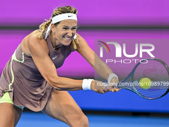 Victoria Azarenka from Belarus is playing in her first-round match against Magdalena Frech of Poland at the WTA 1000-Qatar TotalEnergies Ope...