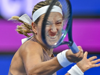 Victoria Azarenka from Belarus is playing in her first-round match against Magdalena Frech of Poland at the WTA 1000-Qatar TotalEnergies Ope...