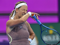 Victoria Azarenka of Belarus is reacting during her first-round match against Magdalena Frech of Poland at the WTA 1000-Qatar TotalEnergies...