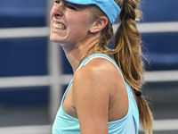 Magdalena Frech of Poland is reacting during her first-round match against Victoria Azarenka of Belarus at the WTA 1000-Qatar TotalEnergies...