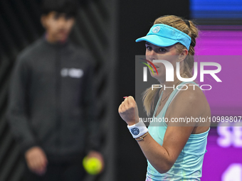 Victoria Azarenka of Belarus is reacting during her first-round match against Magdalena Frech of Poland at the WTA 1000-Qatar TotalEnergies...