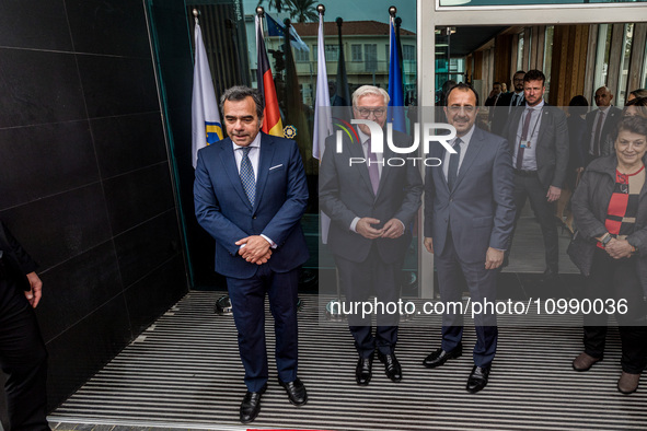 Constantinos Yiorkadjis (L), Frank-Walter Steinmeier (M), and Nikos Christodoulides (R) are posing in front of the Town Hall in Nicosia, Cyp...