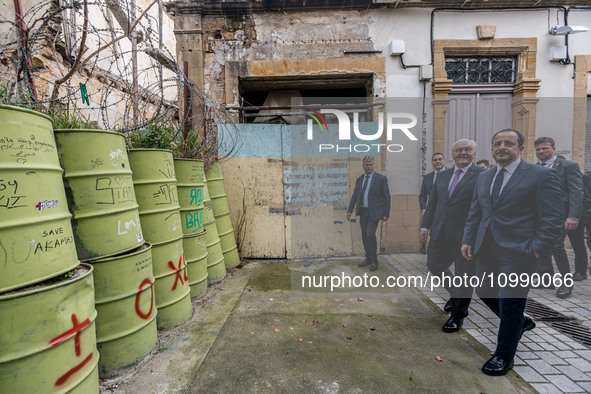 President Frank-Walter Steinmeier of Germany and President Nikos Christodoulides of Cyprus are walking towards a section of the ''Green Line...