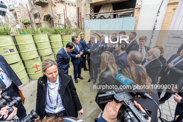 President Frank-Walter Steinmeier of Germany is being guided through the divided city of Nicosia, Cyprus, by President Nikos Christodoulides...