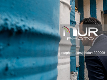 Nikos Christodoulides is looking through the barricade to the occupied part of Nicosia, Cyprus, on February 12, 2024. The President of Germa...