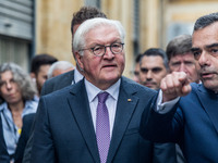 Constantinos Yiorkadjis is speaking to Frank-Walter Steinmeier during the tour in Nicosia, Cyprus, on February 12, 2024. The President of Ge...