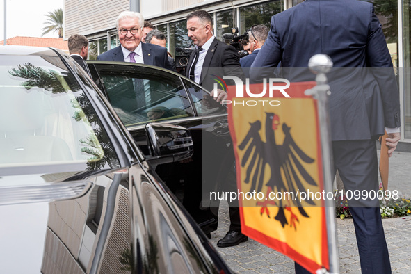 President Frank-Walter Steinmeier of Germany is entering his car after touring the old city of Nicosia, where the barricades that separate t...