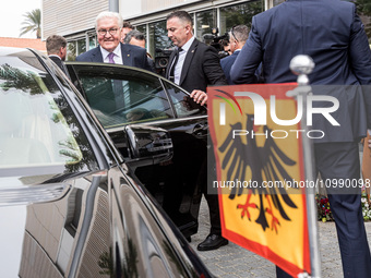 President Frank-Walter Steinmeier of Germany is entering his car after touring the old city of Nicosia, where the barricades that separate t...