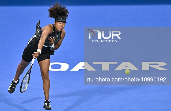 Naomi Osaka of Japan is playing in her first-round match against Caroline Garcia of France at the WTA 1000-Qatar TotalEnergies Open tennis t...