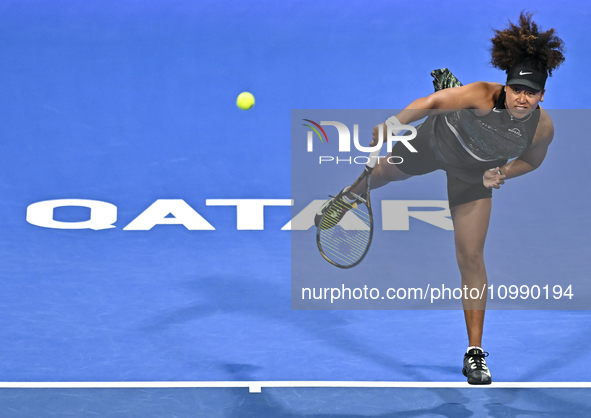 Naomi Osaka of Japan is playing in her first-round match against Caroline Garcia of France at the WTA 1000-Qatar TotalEnergies Open tennis t...