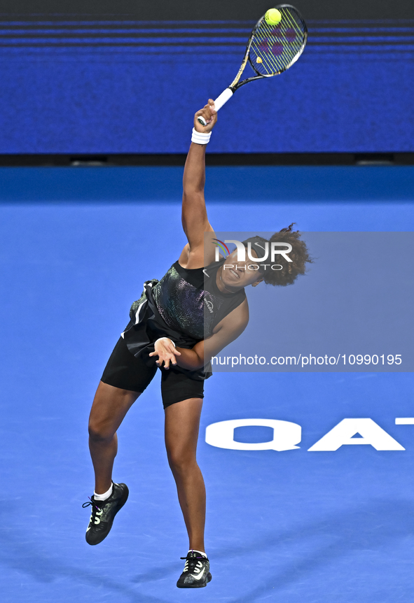 Naomi Osaka of Japan is playing in her first-round match against Caroline Garcia of France at the WTA 1000-Qatar TotalEnergies Open tennis t...