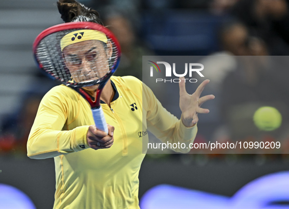 Caroline Garcia of France is in action during her first-round match against Naomi Osaka of Japan at the WTA 1000-Qatar TotalEnergies Open te...