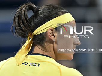 Caroline Garcia of France is reacting during her first-round match against Naomi Osaka of Japan at the WTA 1000-Qatar TotalEnergies Open ten...