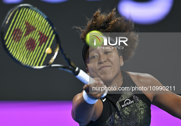 Naomi Osaka of Japan is playing in her first-round match against Caroline Garcia of France at the WTA 1000-Qatar TotalEnergies Open tennis t...