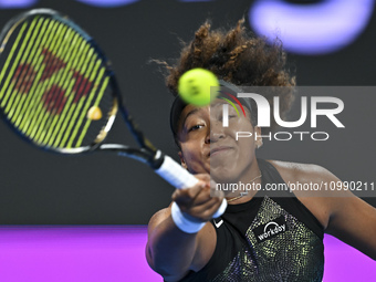 Naomi Osaka of Japan is playing in her first-round match against Caroline Garcia of France at the WTA 1000-Qatar TotalEnergies Open tennis t...