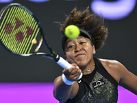 Naomi Osaka of Japan is playing in her first-round match against Caroline Garcia of France at the WTA 1000-Qatar TotalEnergies Open tennis t...