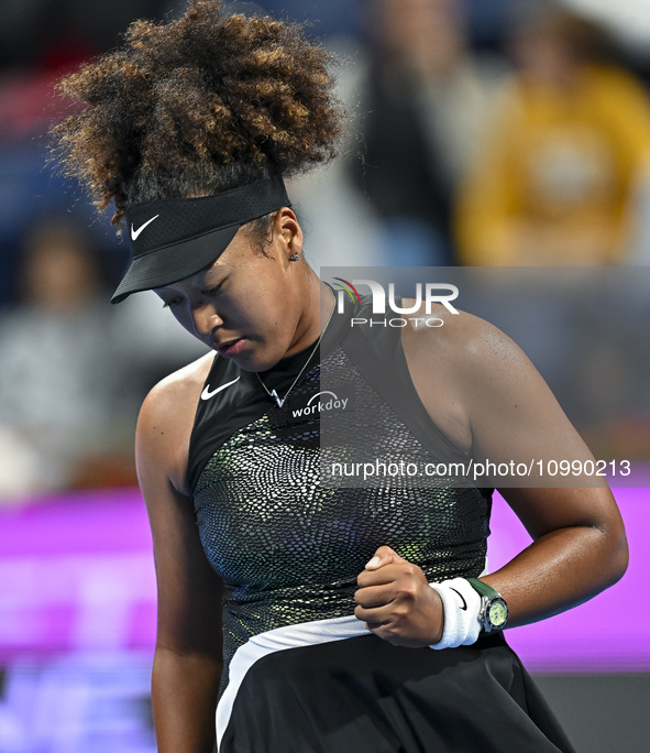 Naomi Osaka of Japan is reacting during her first-round match against Caroline Garcia of France at the WTA 1000-Qatar TotalEnergies Open ten...