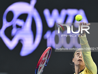 Caroline Garcia of France is in action during her first-round match against Naomi Osaka of Japan at the WTA 1000-Qatar TotalEnergies Open te...