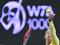 Caroline Garcia of France is in action during her first-round match against Naomi Osaka of Japan at the WTA 1000-Qatar TotalEnergies Open te...