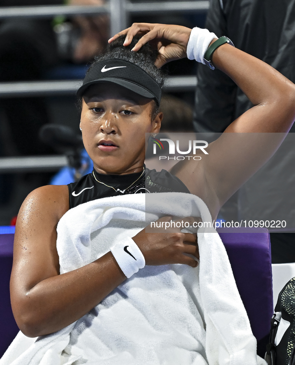 Naomi Osaka of Japan is reacting during her first-round match against Caroline Garcia of France at the WTA 1000-Qatar TotalEnergies Open ten...