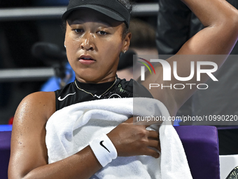 Naomi Osaka of Japan is reacting during her first-round match against Caroline Garcia of France at the WTA 1000-Qatar TotalEnergies Open ten...