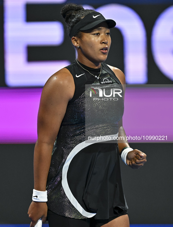 Naomi Osaka of Japan is reacting during her first-round match against Caroline Garcia of France at the WTA 1000-Qatar TotalEnergies Open ten...