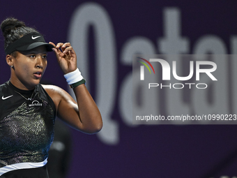 Naomi Osaka of Japan is reacting during her first-round match against Caroline Garcia of France at the WTA 1000-Qatar TotalEnergies Open ten...