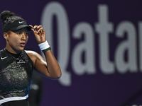 Naomi Osaka of Japan is reacting during her first-round match against Caroline Garcia of France at the WTA 1000-Qatar TotalEnergies Open ten...