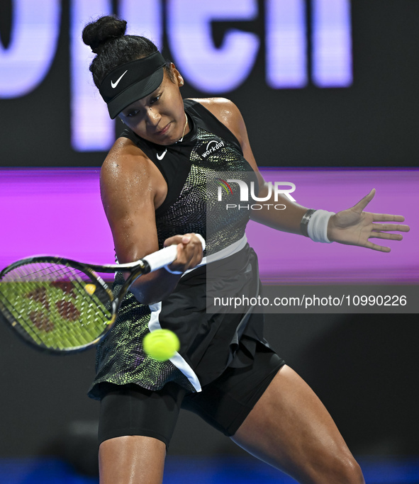 Naomi Osaka of Japan is playing in her first-round match against Caroline Garcia of France at the WTA 1000-Qatar TotalEnergies Open tennis t...